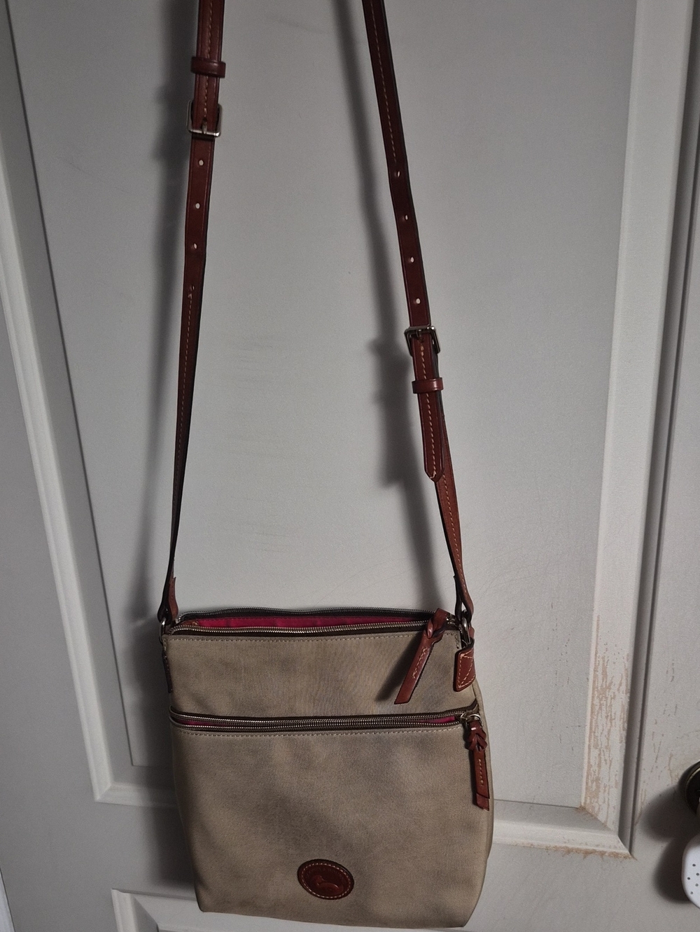 Dooney & Bourke Beige Crossbody with Brown Leather Strap and Red Accent
